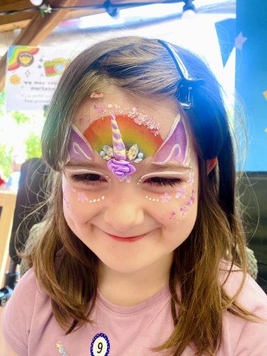 Face painting fun for all ages at a wonderful children's birthday party in Bristol.