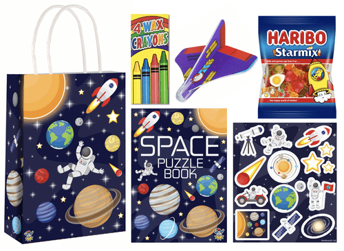 A colourful space-themed gift bag with various toys and sweets.