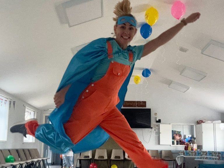 Kids having fun at a superhero-themed birthday party in Bristol. Children celebrating a birthday with TipTopParty superhero fun.